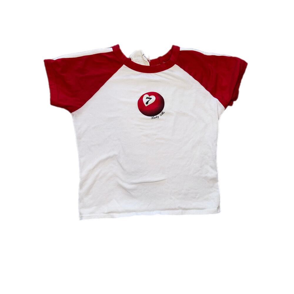 French Pastry M Y2K-style baby tee ft a ball with a heart-shaped "7 & Lucky Me"